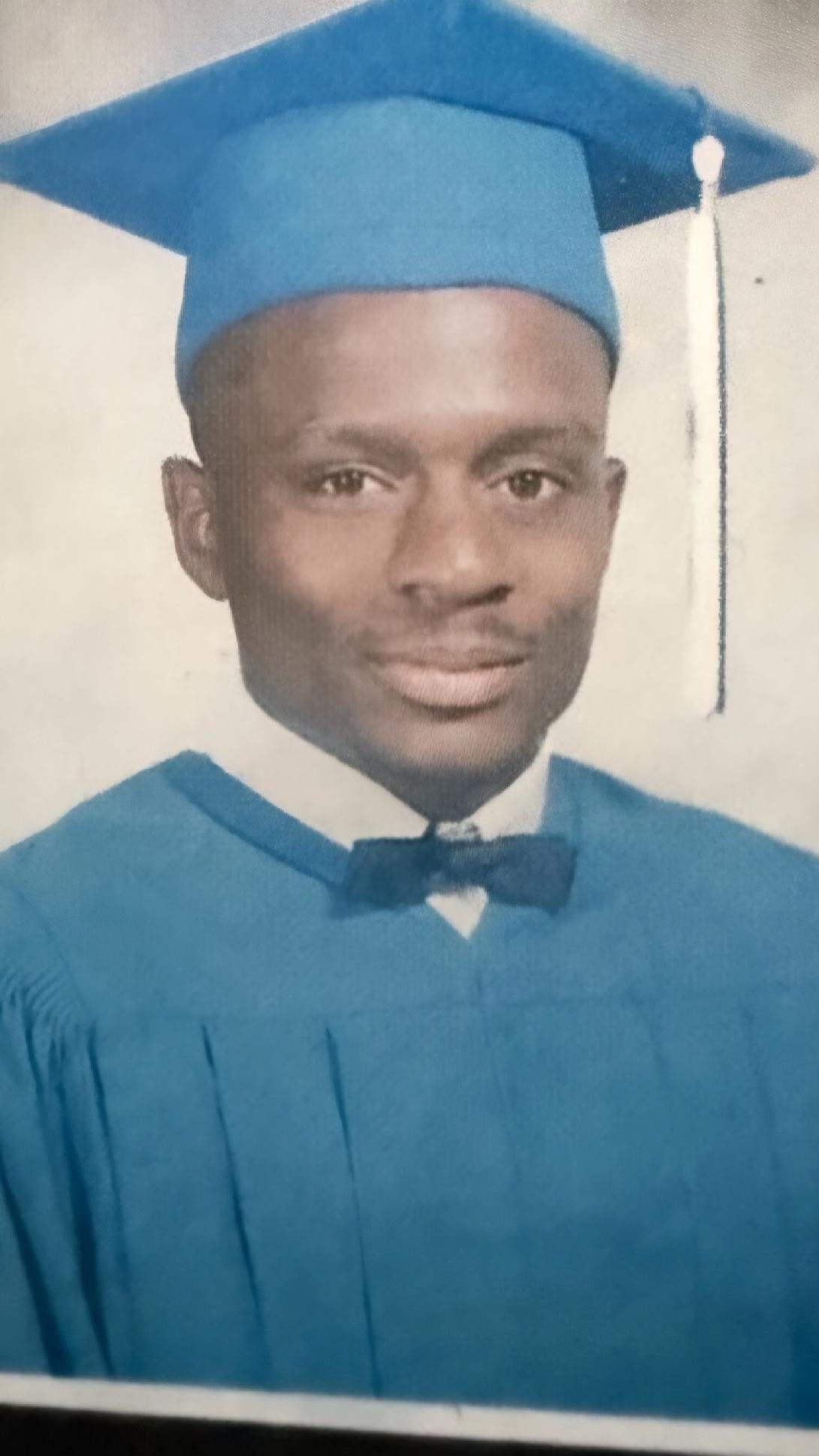 WPHS Class of 87 graduate portrait in cap and gown