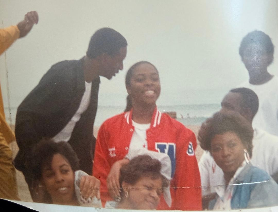 Group of classmates gathered together at the beach