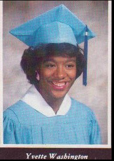 Yvette Washington graduation portrait in light blue cap and gown, Class of 1987